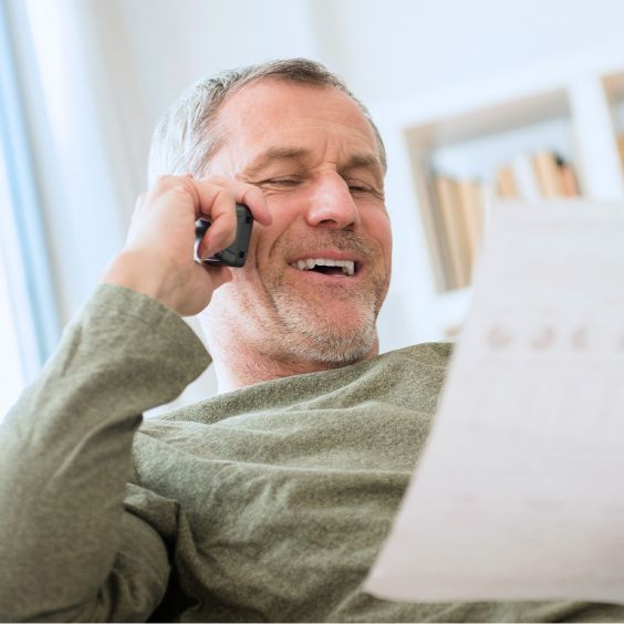 Man on phone connected to Viasat Voice